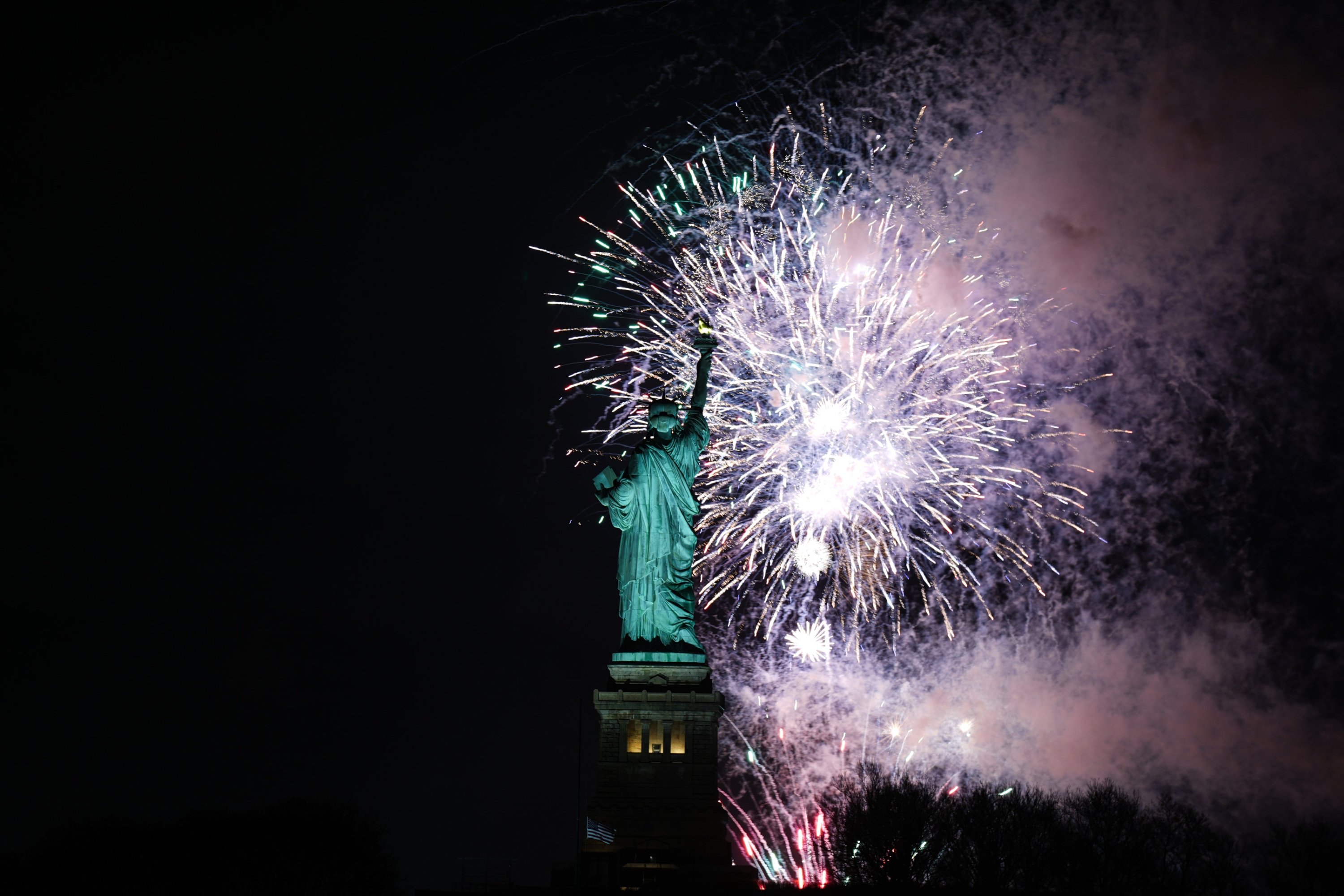 Fireworks illuminate Statue of Liberty in New York, U.S., Dec. 31, 2024. (AA Photo)