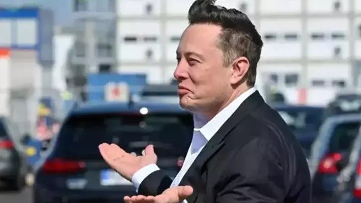 Elon Musk, now also known as &quot;Kekius Maximus,&quot; gesturing confusion with his hands, unknown location, Dec. 30, 2024. (DHA Photo)