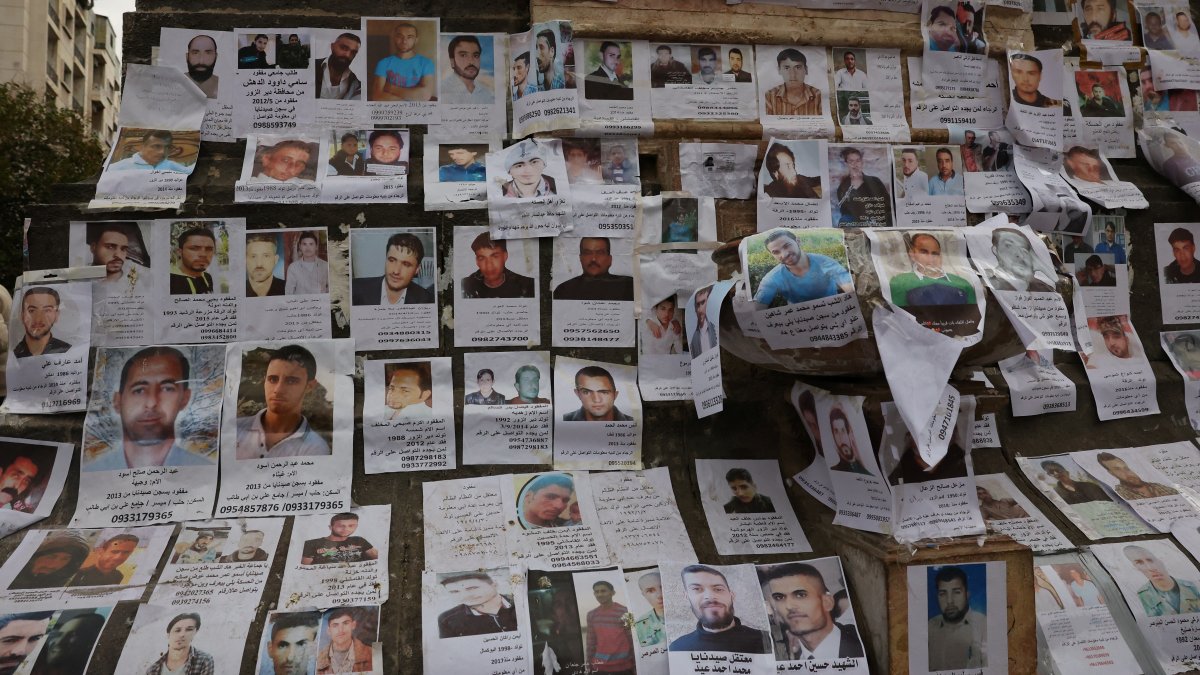 Pictures of missing people believed to be prisoners from Sednaya prison, known as a &quot;slaughterhouse&quot; under Bashar Assad&#039;s rule, hang in Marjeh Square, Damascus, Syria, Dec. 22, 2024. (Reuters Photo)