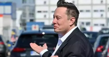 Elon Musk, now also known as &quot;Kekius Maximus,&quot; gesturing confusion with his hands, unknown location, Dec. 30, 2024. (DHA Photo)