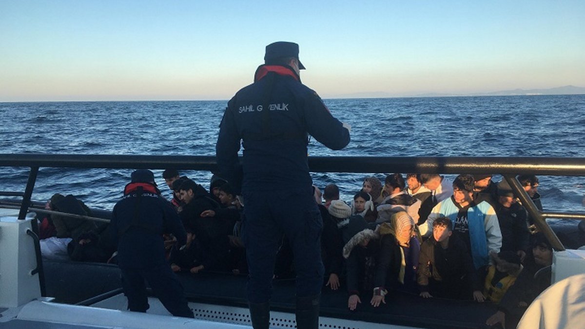 Turkish coast guard picks up a life raft carrying irregular migrants off the coast of western Izmir province, Türkiye, Jan. 1, 2025. (AA Photo)