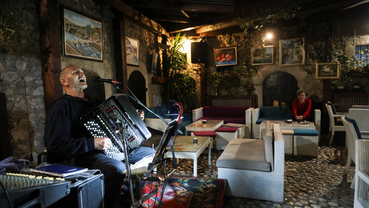 Bosnian musician Enes Salman plays the accordion while performing the traditional love song Sevdalinka, Sarajevo, Bosnia-Herzegovina, Dec. 20, 2024. (Reuters Photo)