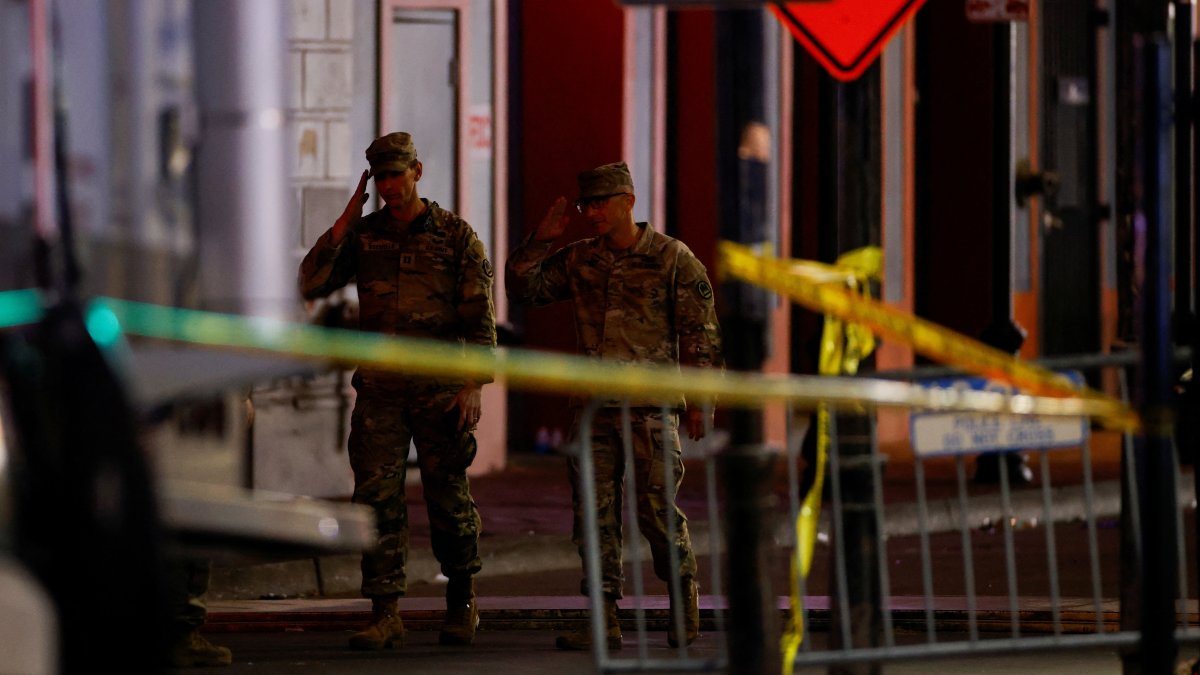 Military personnel gesture as they walk near the site of a truck-ramming attack in New Orleans, Louisiana, U.S., Jan. 1, 2025. (Reuters Photo)