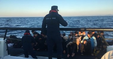 Turkish coast guard picks up a life raft carrying irregular migrants off the coast of western Izmir province, Türkiye, Jan. 1, 2025. (AA Photo)