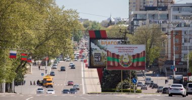 The coat of arms of Transnistria is depicted on a banner in central Tiraspol, in Moldova&#039;s breakaway region of Transnistria, May 5, 2022. (Reuters Photo)