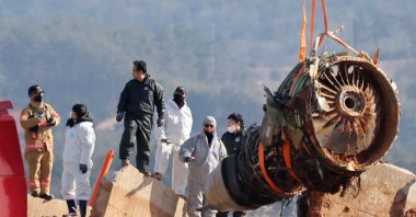 Teams salvage an engine of the Jeju Air Boeing 737-800 aircraft which crashed and burst into flames at Muan International Airport, Muan, South Korea, Jan. 3, 2025. (AFP Photo)