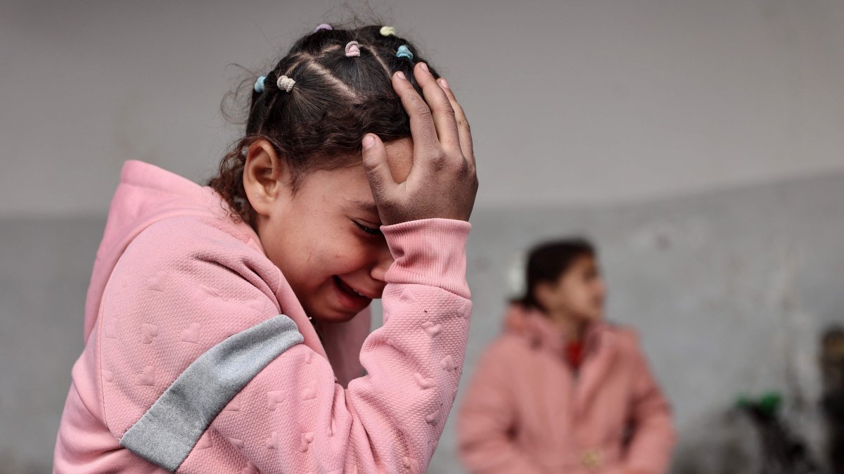 A Palestinian child mourns the death of members of the al-Ghoula family in Israeli attacks in Gaza City, Gaza, Palestine, Jan. 4, 2025. (AP Photo)