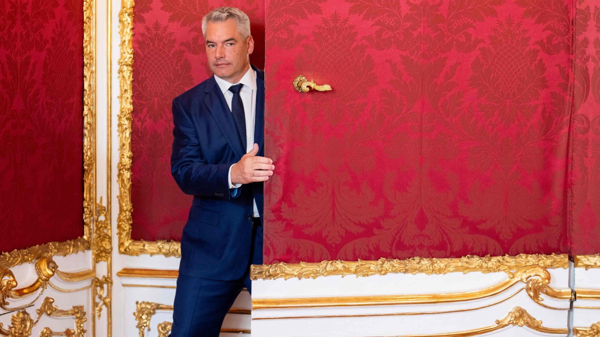 Austrian Chancellor Karl Nehammer walks at the Presidential Chancellery in Vienna, Austria, Oct. 21, 2024. (AFP Photo)