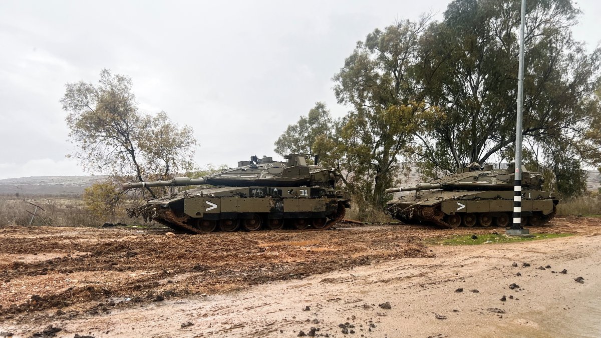 Israeli tanks are seen on a road following the cease-fire between Israel and Hezbollah, near the Israel-Lebanon border in northern Israel, Dec. 29, 2024. (Reuters Photo)