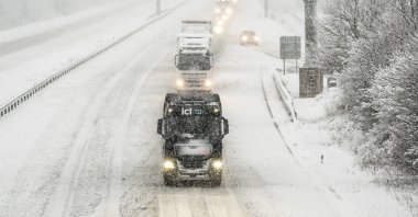 Vehicles navigate the A1(M) near Hopperton, north England, U.K., Jan. 5, 2025. (AP Photo)