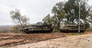 Israeli tanks are seen on a road following the cease-fire between Israel and Hezbollah, near the Israel-Lebanon border in northern Israel, Dec. 29, 2024. (Reuters Photo)