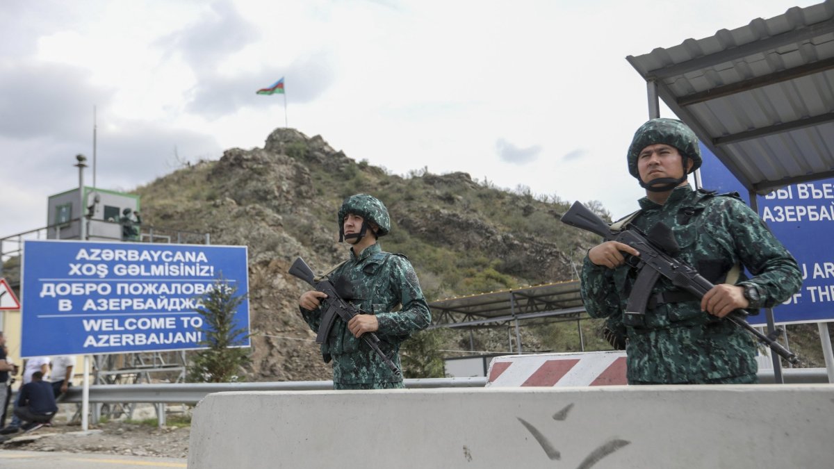 Azerbaijani soldiers guard the Lachin checkpoint, Azerbaijan, Oct. 1, 2023. (AP Photo)