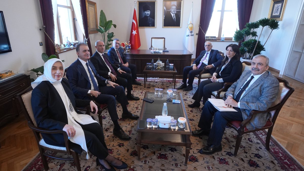 The ruling Justice and Development Party (AK Party) delegation (L) poses ahead of a meeting with the lawmakers of the Peoples&#039; Equality and Democracy Party (DEM Party), Ankara, Türkiye, Dec. 6, 2024. (AA Photo)