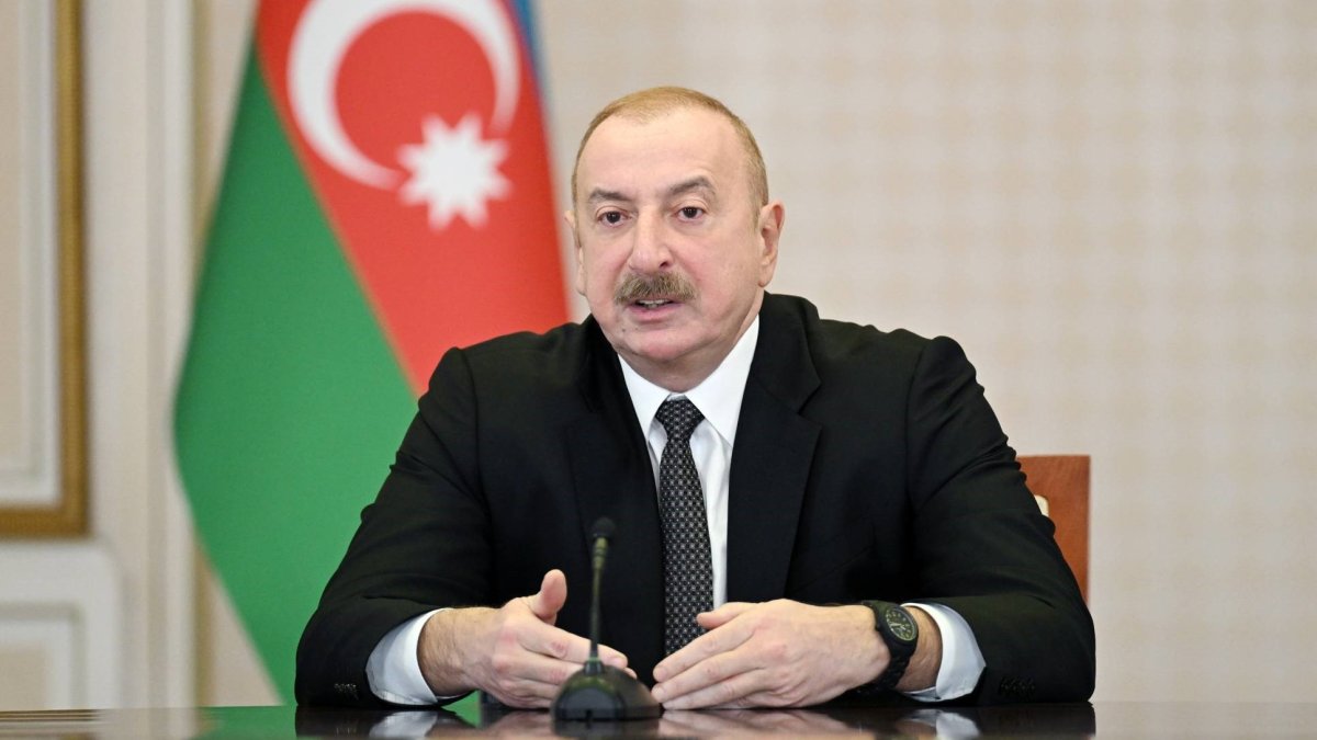 President Ilham Aliyev speaks while meeting the surviving crew and family members of the crew who died in Azerbaijan Airlines plane crash, Baku, Azerbaijan, Jan. 6, 2025. (IHA Photo)