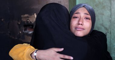 Women react following an Israeli strike on the UNWRA Al-Majda Wasila Governmental School housing displaced Palestinians, Gaza, Palestine, Dec.14, 2024. (AFP Photo)