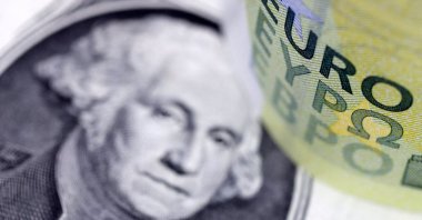 U.S. dollar and euro banknotes are seen in this illustration taken July 17, 2022. (Reuters Photo)