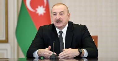 President Ilham Aliyev speaks while meeting the surviving crew and family members of the crew who died in Azerbaijan Airlines plane crash, Baku, Azerbaijan, Jan. 6, 2025. (IHA Photo)