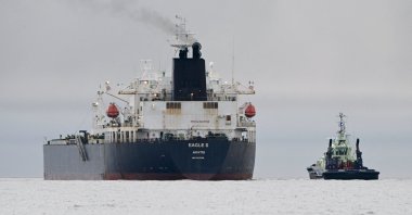 A photo taken off Porkkalanniemi, Kirkkonummi, in the Gulf of Finland, shows oil tanker Eagle S, which flies under the flag of the Cook Islands, next to tugboat Ukko, Dec. 26, 2024. (AFP Photo)