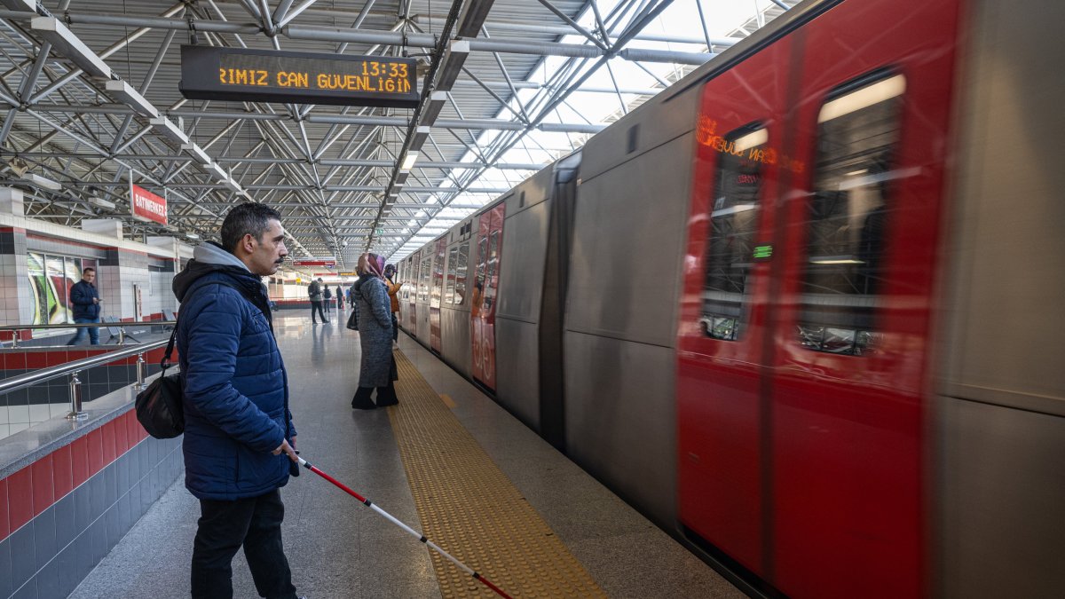 A visually impaired person uses the metro, Ankara, Türkiye, Dec. 19, 2024. (AA Photo)