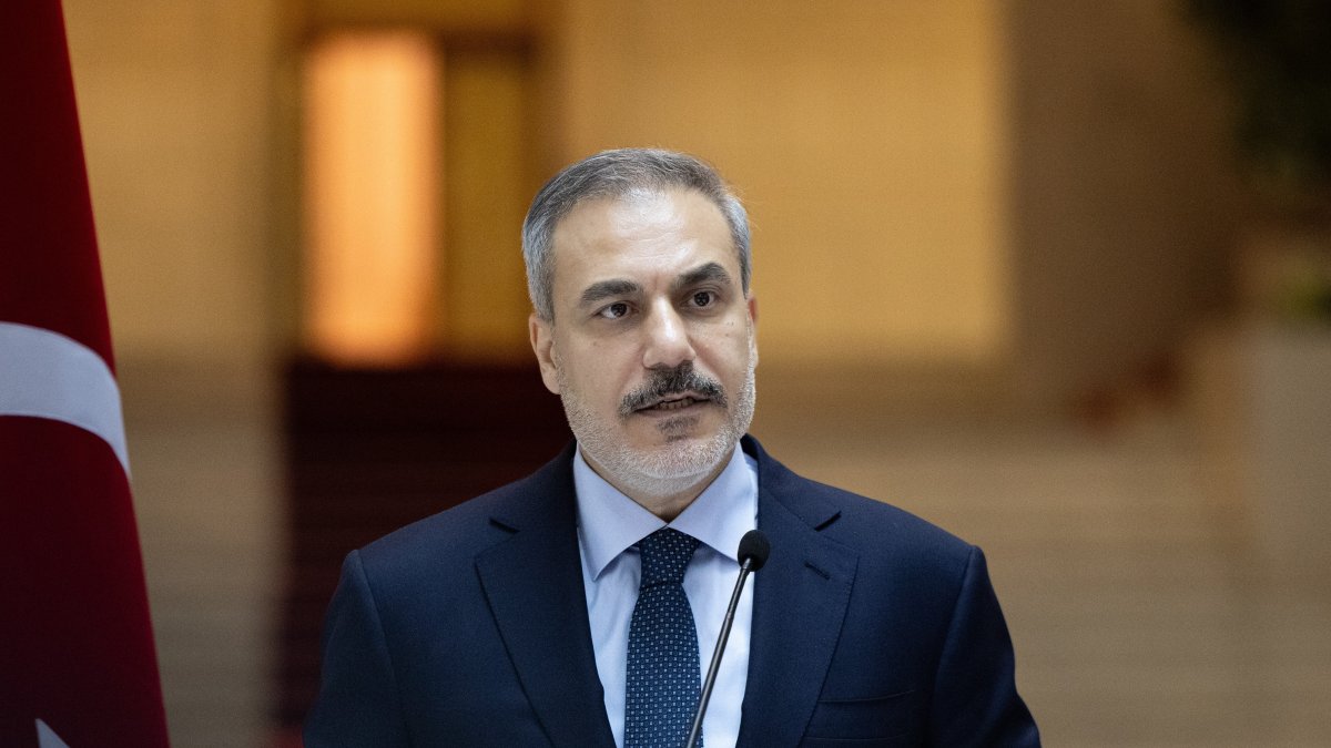 Foreign Minister Hakan Fidan speaks to reporters at an unidentified location in this photo released Jan. 7, 2025. (IHA File Photo)