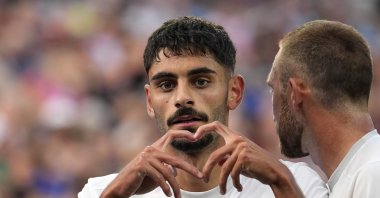 Eren Dinkçi celebrates after he scores his side&#039;s first goal during the German Bundesliga match between Bayer Leverkusen and FC Heidenheim, Leverkusen, Germany, Sept. 24, 2023. (AP Photo)