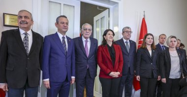 Republican People's Party (CHP) Chair Özgür Özel (2nd L) poses ahead of a meeting with Peoples' Equality and Democracy Party (DEM Party) lawmakers Pervin Buldan (C), Sırrı Süreyya Önder (L) and Ahmet Türk (3rd L) at Parliament, Ankara, Türkiye, Jan. 7, 2024. (AA Photo)