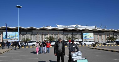 Travellers exit the Damascus International Airport, Jan. 7, 2025. (AFP Photo)
