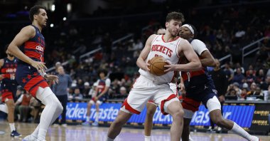 Houston Rockets center Alperen Şengün (C) drives to the basket as Washington Wizards guard Bilal Coulibaly (R) defends in the fourth quarter at Capital One Arena, Washington, U.S., Jan. 7, 2025. (Reuters Photo)