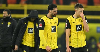 Dortmund's Emre Can (C) and Nico Schlotterbeck react after the German 1st-division Bundesliga match between Borussia Dortmund and TSG Hoffenheim, Dortmund, Germany, Dec. 15, 2024. (AFP Photo)