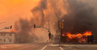 Flames from the wind-driven Eaton Fire engulf a house in Altadena, California, Jan. 8, 2025. (AFP Photo)