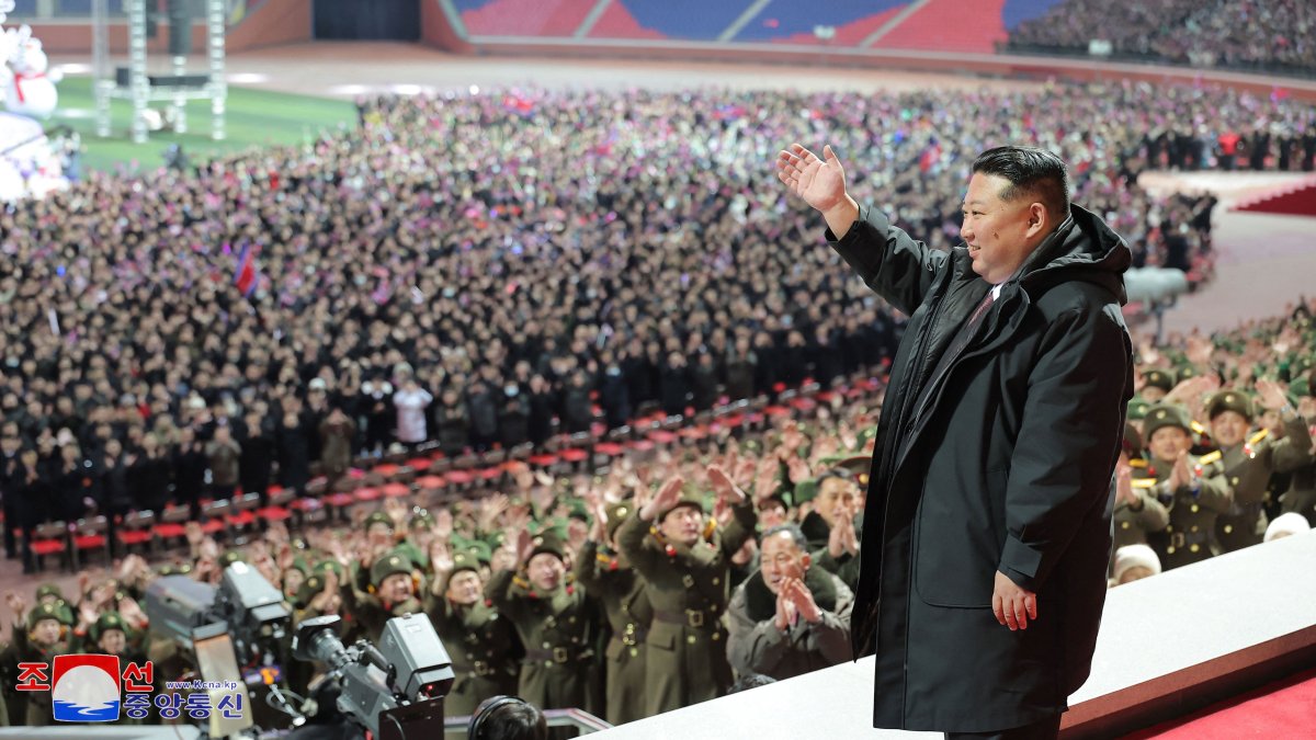 North Korea&#039;s leader Kim Jong Un waving as he attends a performance to celebrate the New Year at May Day Stadium in Pyongyang, North Korea, Dec. 31, 2024. (AFP Photo)