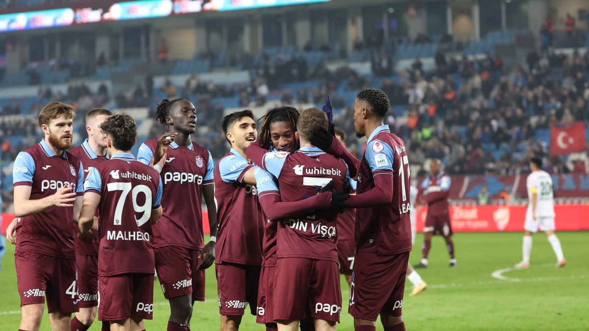 Trabzonspor players celebrate during the Turkish Cup match against Alanyaspor at the Papara Park, Trabzon, Türkiye, Jan. 8, 2025. (DHA Photo)