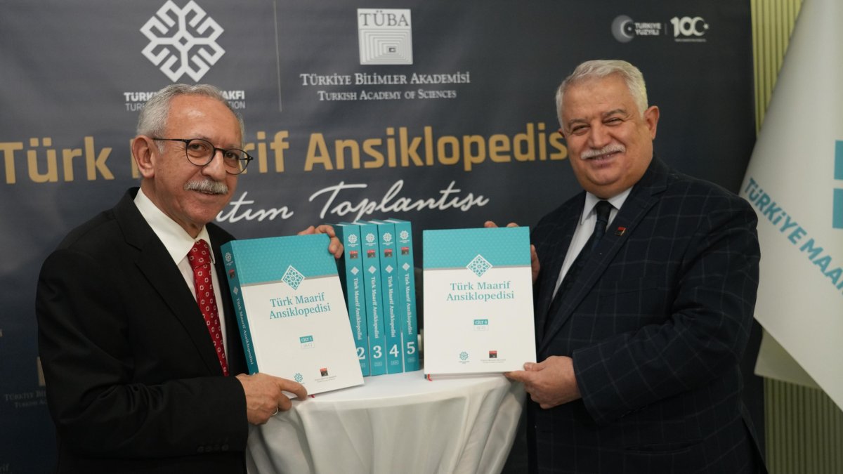 TÜBA President professor Muzaffer Şeker (R) and Türkiye Maarif Foundation Vice President professor Ahmet Emre Bilgili (R) at the launch of the Türkiye Maarif Encyclopedia, Istanbul, Türkiye, Jan. 8, 2024. (Courtesy of Türkiye Maarif Foundation)