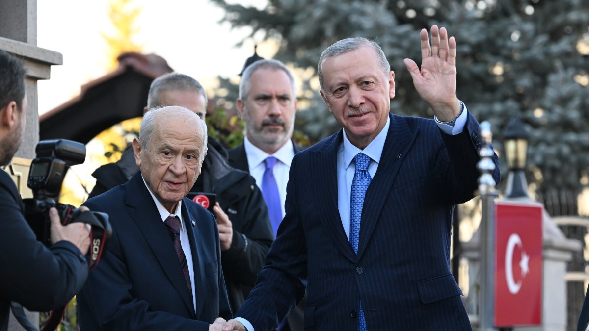 President Recep Tayyip Erdoğan and MHP Chairman Devlet Bahçeli shake hands as they meet at Bahçeli&#039;s home in Ankara, Jan. 9, 2025. (AA Photo)