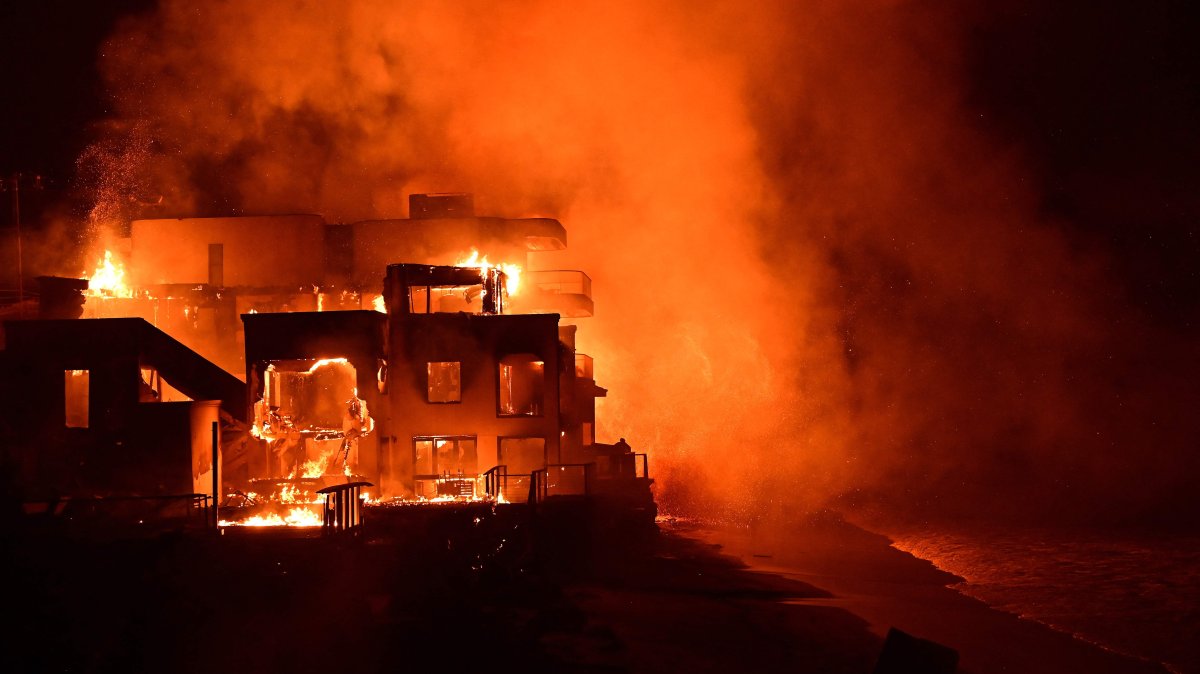 A beach house is engulfed in flames as the Palisades Fire burns along Pacific Coast Highway in Malibu, California, U.S., Jan. 8, 2025. (AFP Photo)