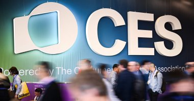The CES logo is displayed as attendees enter an exhibit hall during the Consumer Electronics Show (CES), Las Vegas, U.S., Jan. 7, 2025. (AFP Photo)