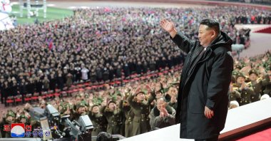 North Korea&#039;s leader Kim Jong Un waving as he attends a performance to celebrate the New Year at May Day Stadium in Pyongyang, North Korea, Dec. 31, 2024. (AFP Photo)