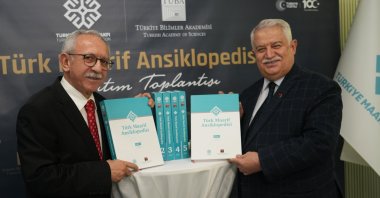TÜBA President professor Muzaffer Şeker (R) and Türkiye Maarif Foundation Vice President professor Ahmet Emre Bilgili (R) at the launch of the Türkiye Maarif Encyclopedia, Istanbul, Türkiye, Jan. 8, 2024. (Courtesy of Türkiye Maarif Foundation)