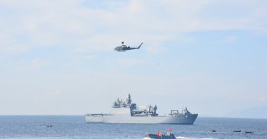 A view of naval vessels and a helicopter during the Blue Homeland exercises off the coast of Muğla, southwestern Türkiye, Jan. 9, 2025. (AA Photo)