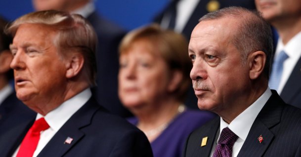 U.S. President Donald Trump and President Recep Tayyip Erdoğan pose for a group photo during the annual NATO heads of government summit at the Grove Hotel in Watford, Britain, December 4, 2019.  (REUTERS Photo)