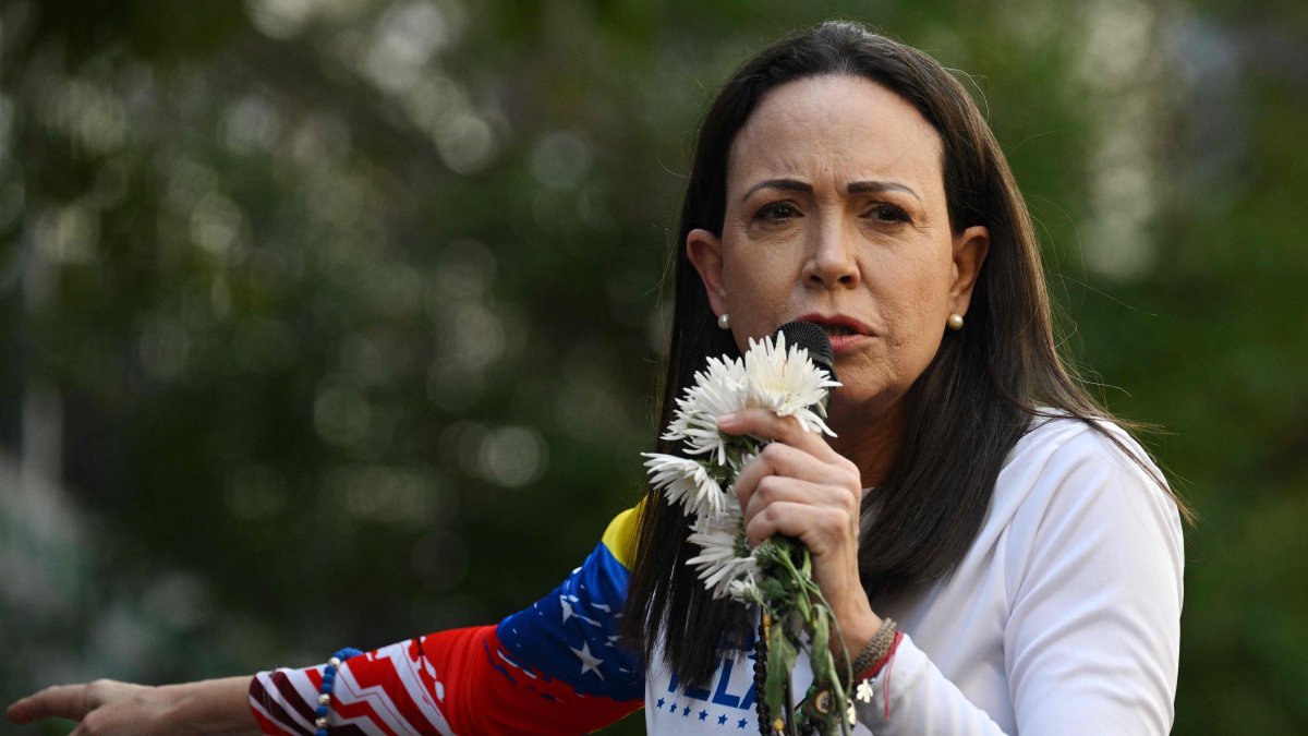 Venezuelan opposition leader Maria Corina Machado addresses supporters during a protest called by the opposition on the eve of the presidential inauguration, Caracas, Venezuela, Jan. 9, 2025. (AFP Photo)