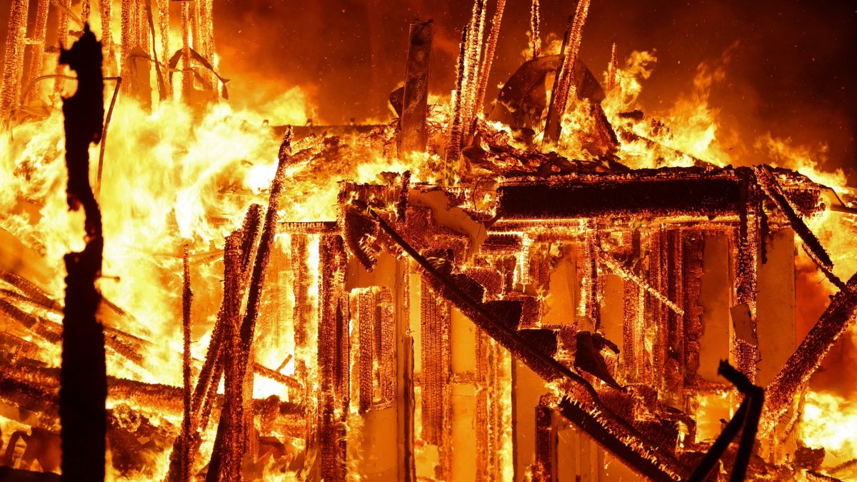 Flames engulf a structure as the Eaton Fire burns, Pasadena, California, U.S. Jan. 7, 2025. (Reuters Photo)