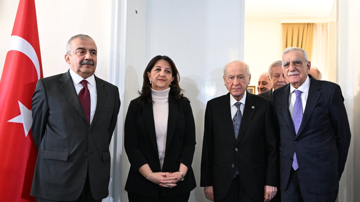 Nationalist Movement Party (MHP) leader Devlet Bahçeli (2nd R) poses ahead of a meeting with Peoples&#039; Equality and Democracy Party (DEM Party) lawmakers Pervin Buldan (2nd L), Sırrı Süreyya Önder (L) and Ahmet Türk (R) at Parliament, Ankara, Türkiye, Jan. 2, 2024. (AA Photo)