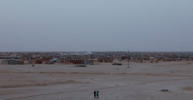 Two Sahrawi children walk toward the Smara Sahrawi refugee camp in Tindouf, Algeria, May 2, 2024. (Reuters Photo)