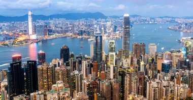 Twilight view of Hong Kong&#039;s skyline, showcasing the towering skyscrapers of downtown Central, Hong Kong, China. (Shutterstock Photo)