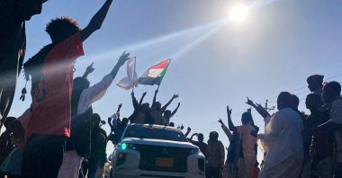 Sudanese people celebrate after the army announced entering key al-Jazira state capital Wad Madani, Jan. 11, 2025. (AFP Photo)