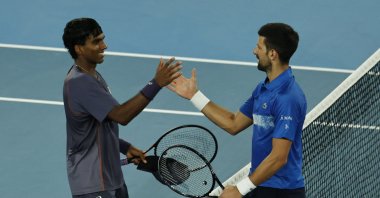Serbia&#039;s Novak Djokovic (R) greets U.S.&#039; Nishesh Basavareddy at the Australian Open, Melbourne Park, Melbourne, Australia, Jan. 13, 2025. (Reuters Photo)
