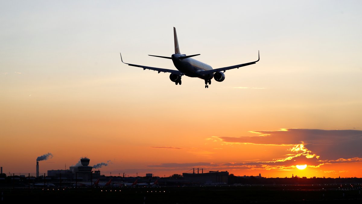 A Turkish Airlines aircraft lands during sunset at Tegel Airport in Berlin, Germany, Oct. 22, 2020. (Reuters Photo)