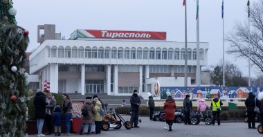 People gather near a Christmas tree in a square in Tiraspol, Moldova&#039;s breakaway region of Transnistria, Jan. 3, 2025. (Reuters Photo)