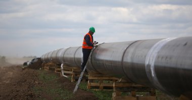 A worker is seen next to a pipe at a construction site on the extension of the TurkStream gas pipeline in Letnitsa, Bulgaria, June 1, 2020. (Reuters Photo)